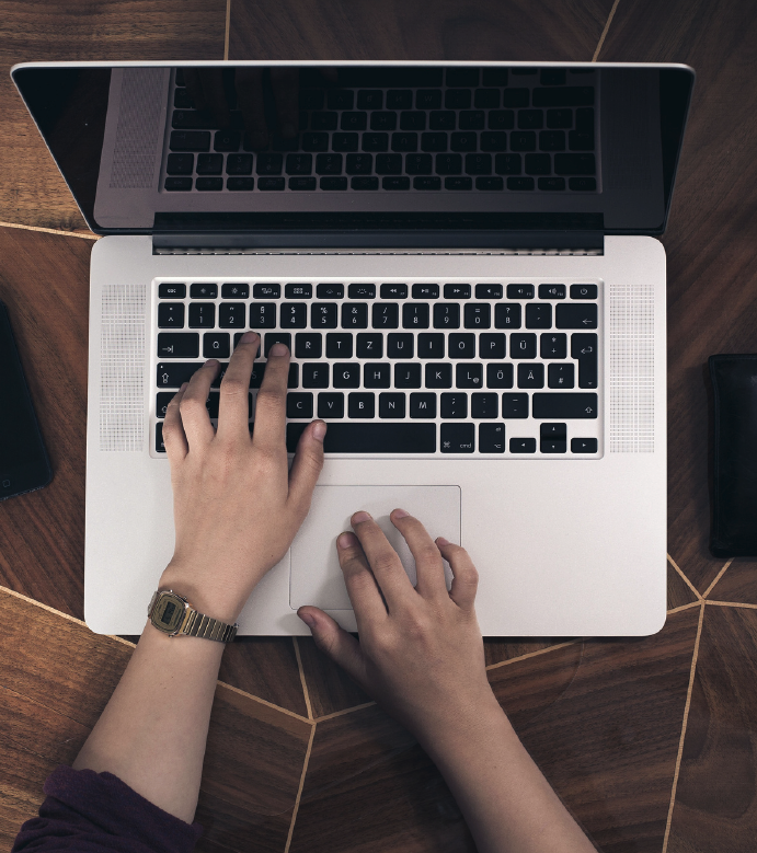 Modern IT workspace with laptop showing business solutions